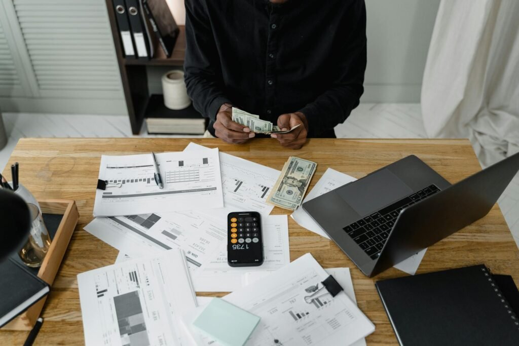 Tax credits-Man at desk counting money